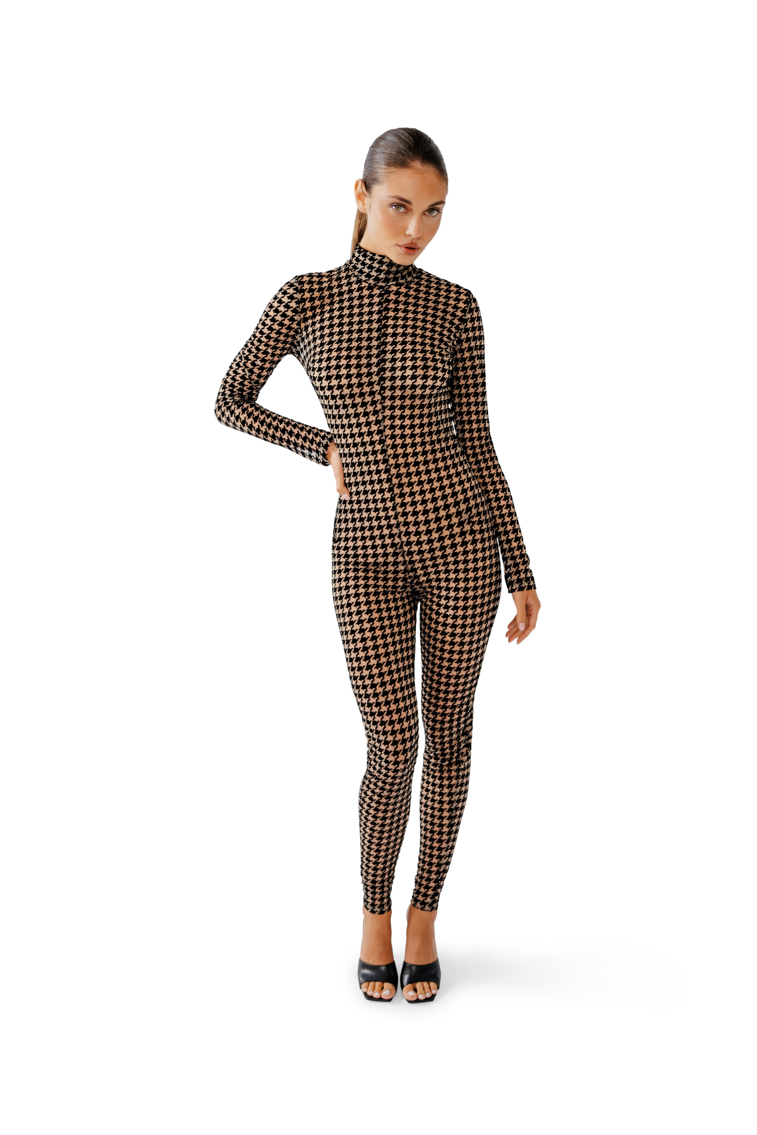 Model wearing Oxford jumpsuit – high neck and elegant fit